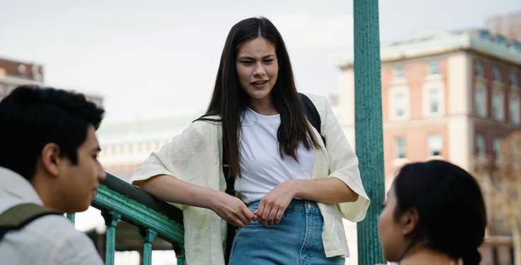 Young adults hanging out on campus
