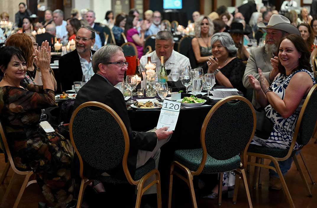 Bidder at Love Is Home Gala